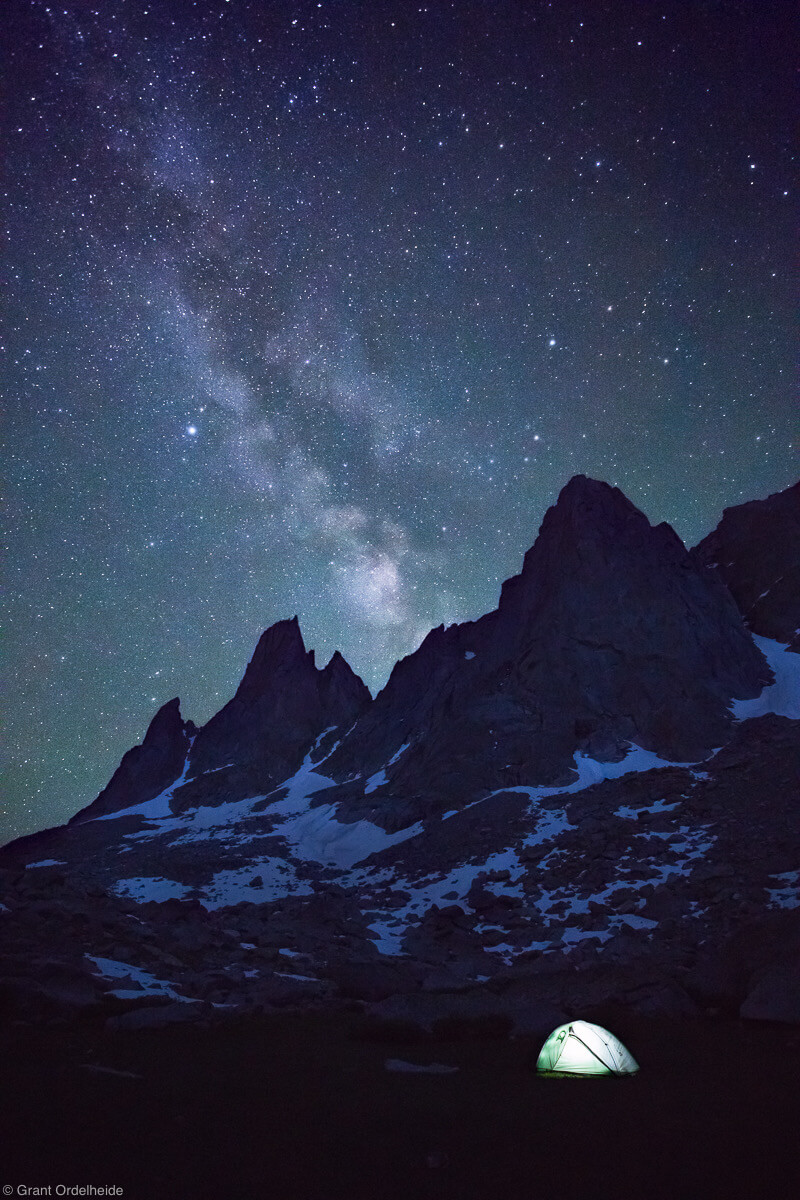 An illuminated tent in Wyoming's Cirque of the towers in the Wind River range.