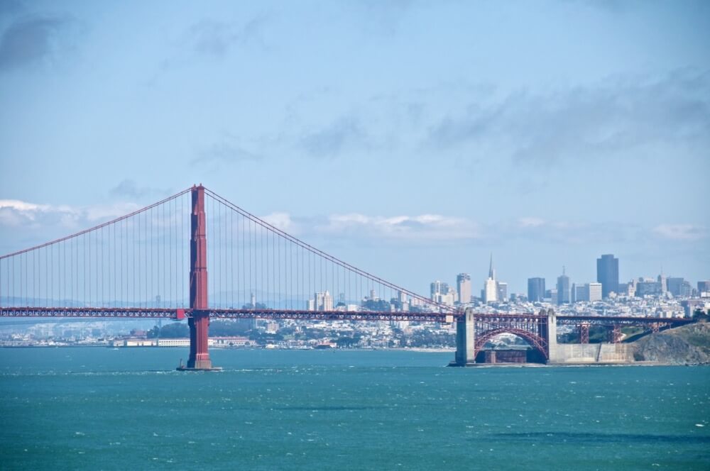 Don DeBold - Golden Gate Bridge and downtown San Francisco as seen from Point Bonita