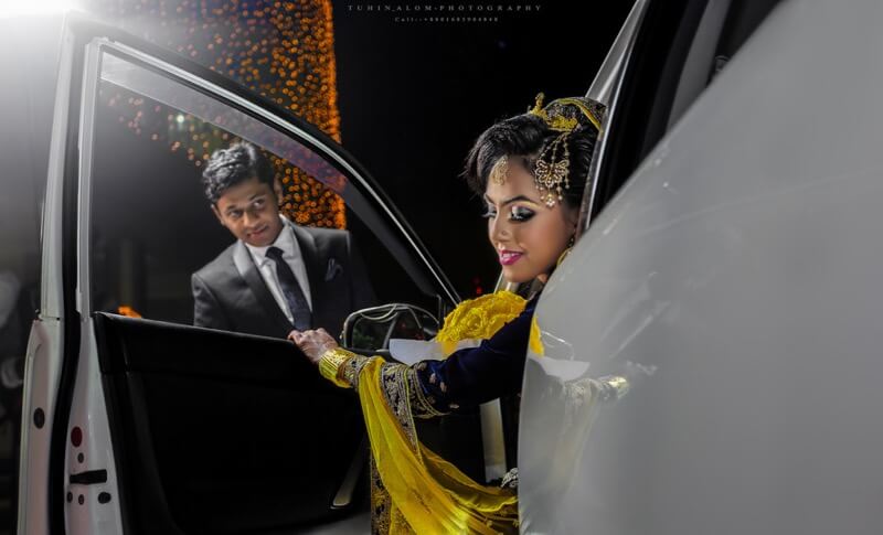 bride getting out of car