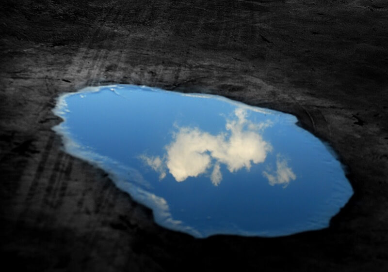 Nxarl Shyam blue sky puddle