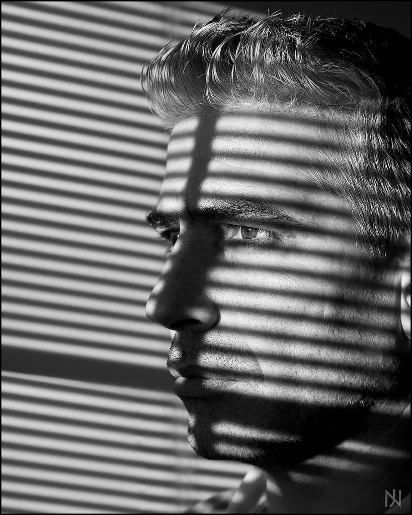 Jack Nobre - window blind shadows portrait