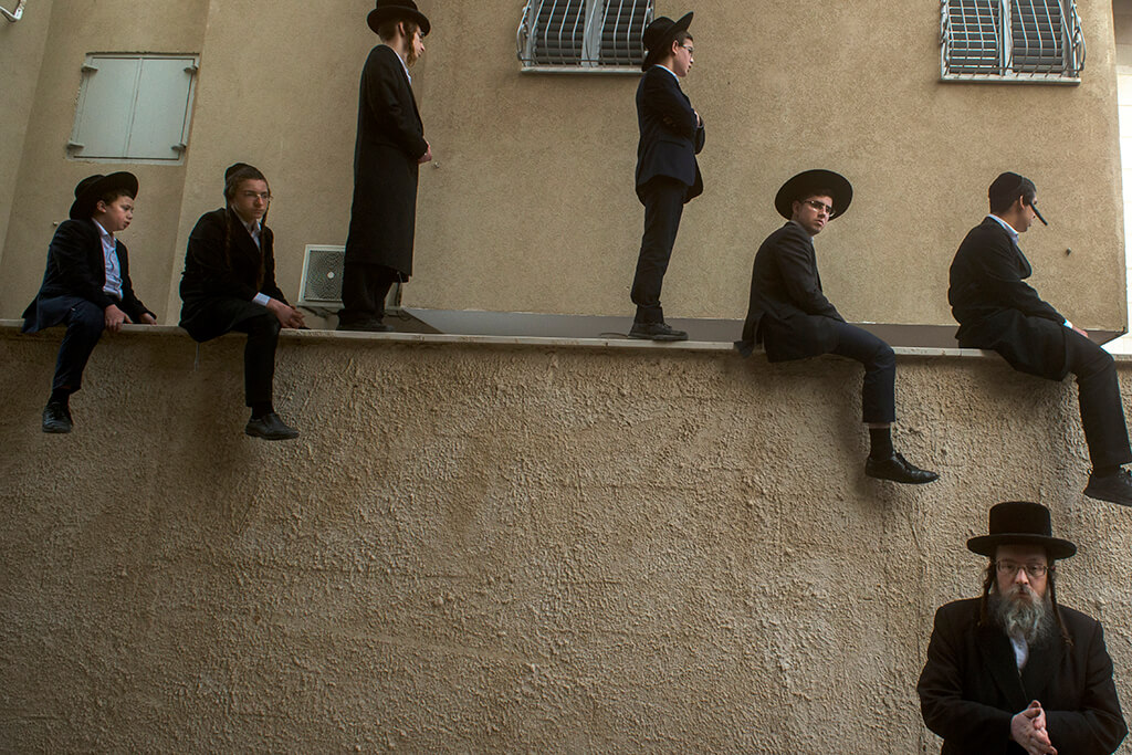 ilan Ben yehuda jewish men on wall