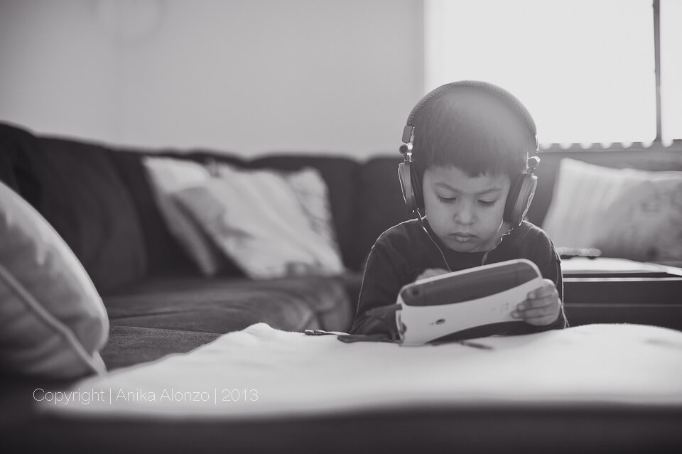 photography by anika alonzo - kid wearing headphones