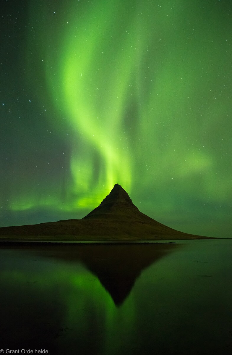 Grant Ordelheide - Auora borealis over Kirkjufell mountain in western Iceland