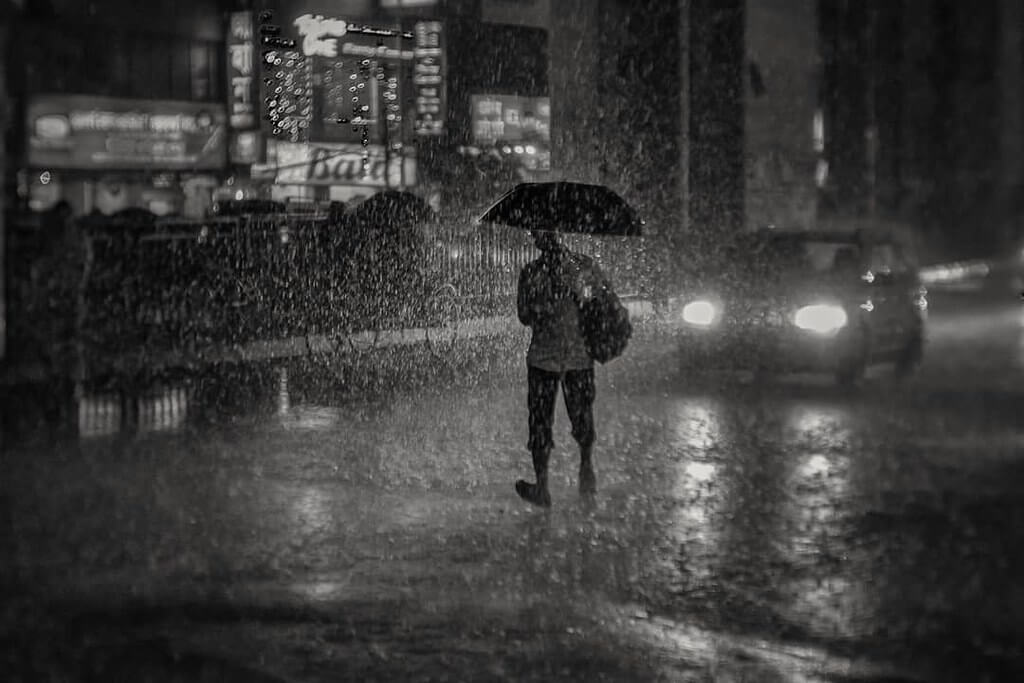 Mohammad Rokonuzzaman khan - walk in rain