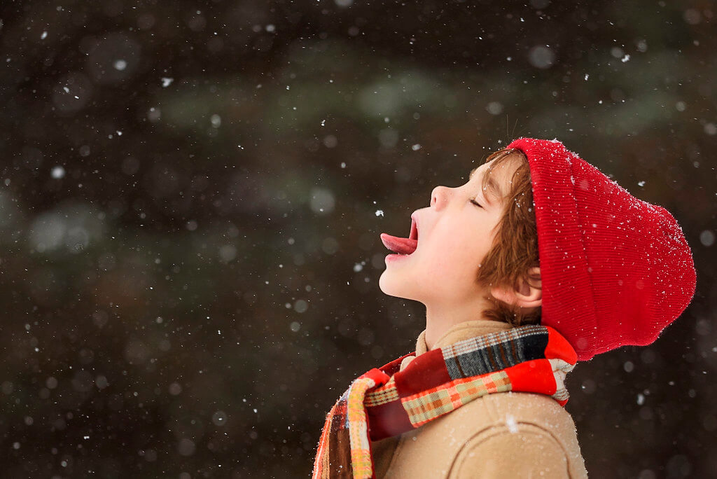 Elizabeth Sallee Bauer - Boy catching snowflake on tongue