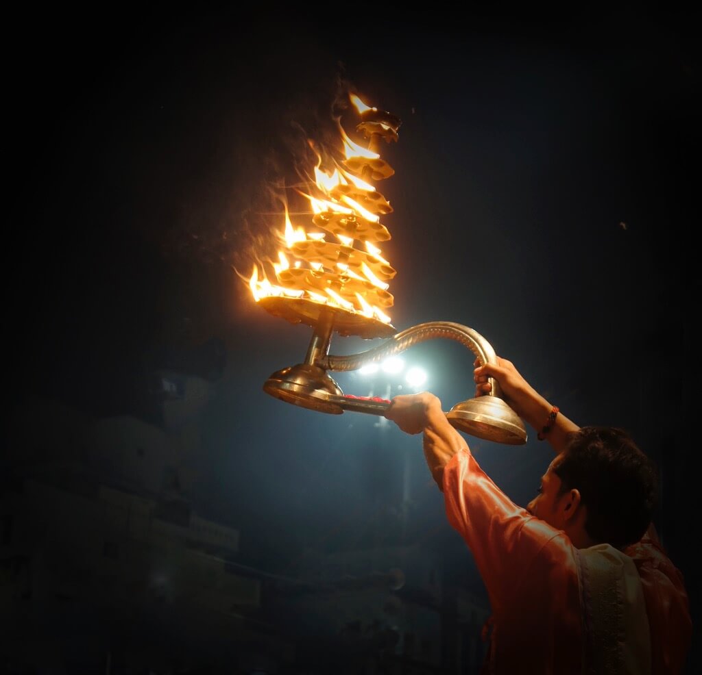 Manish (Valmie) Joshi - Priest performs Aarti ritual at the River Ganga