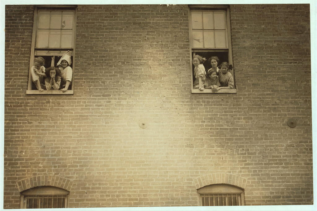 Lewis Wickes Hine - girls looking out window at cigarette factory