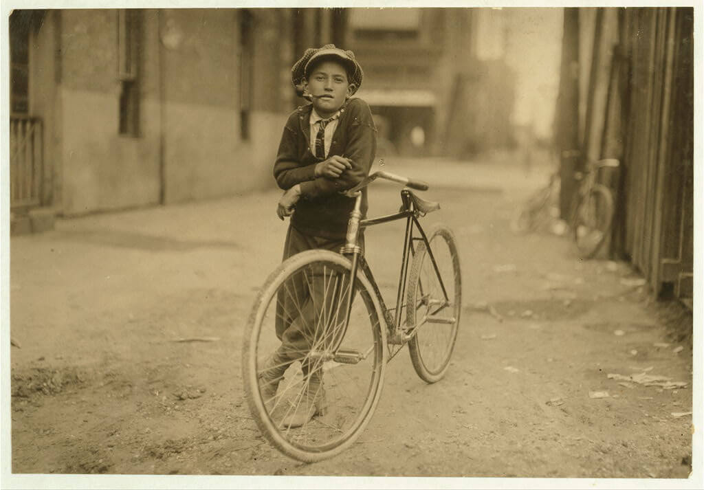 Lewis Wickes Hine - messenger boy with bike