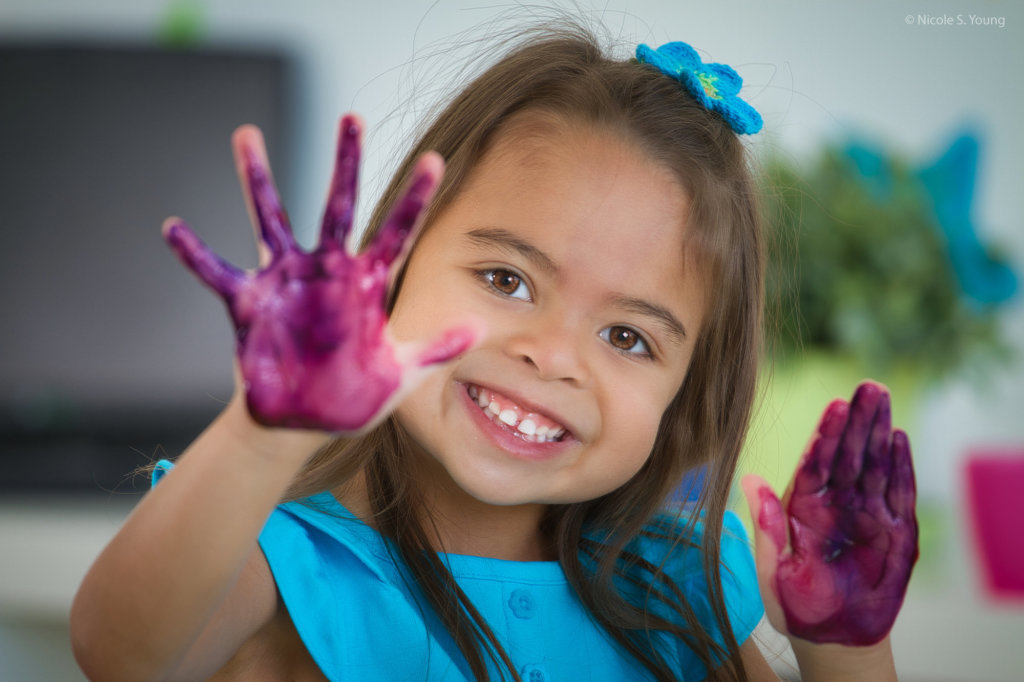 girl with painted hands for quick edit after