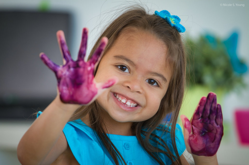 girl with painted hands for quick edit before