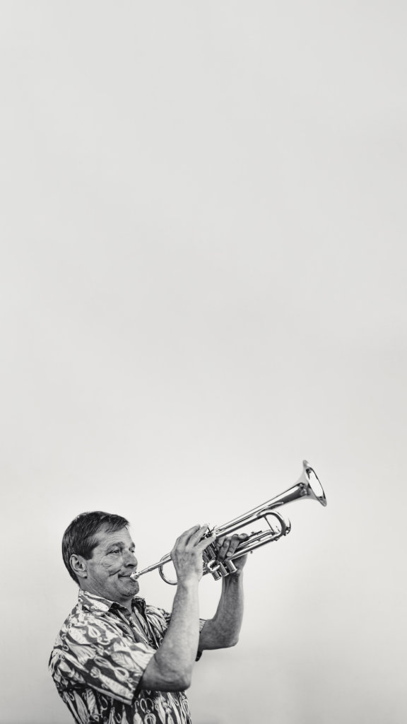 negative space photography with trumpeter in black and white